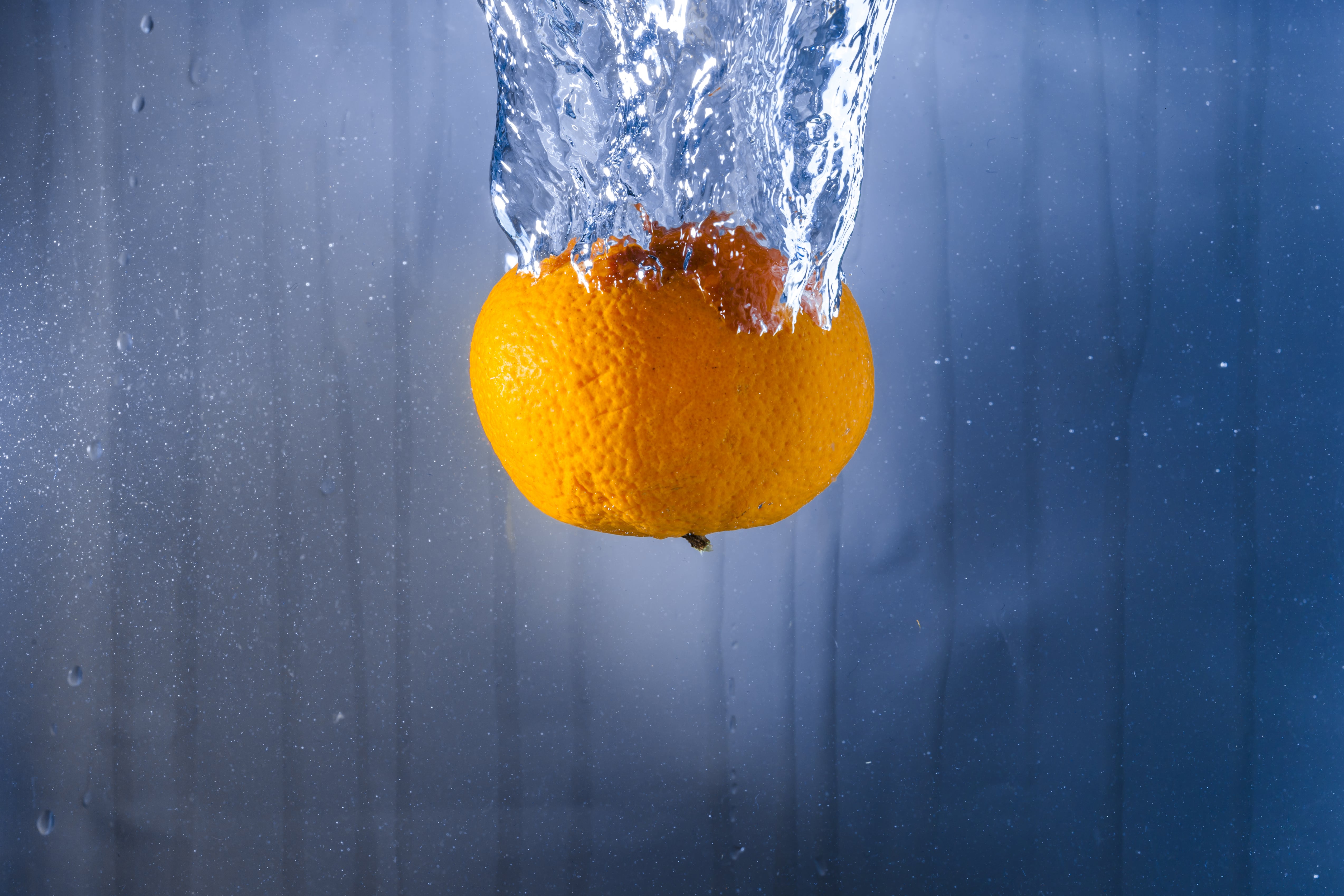 Orange in water for impact